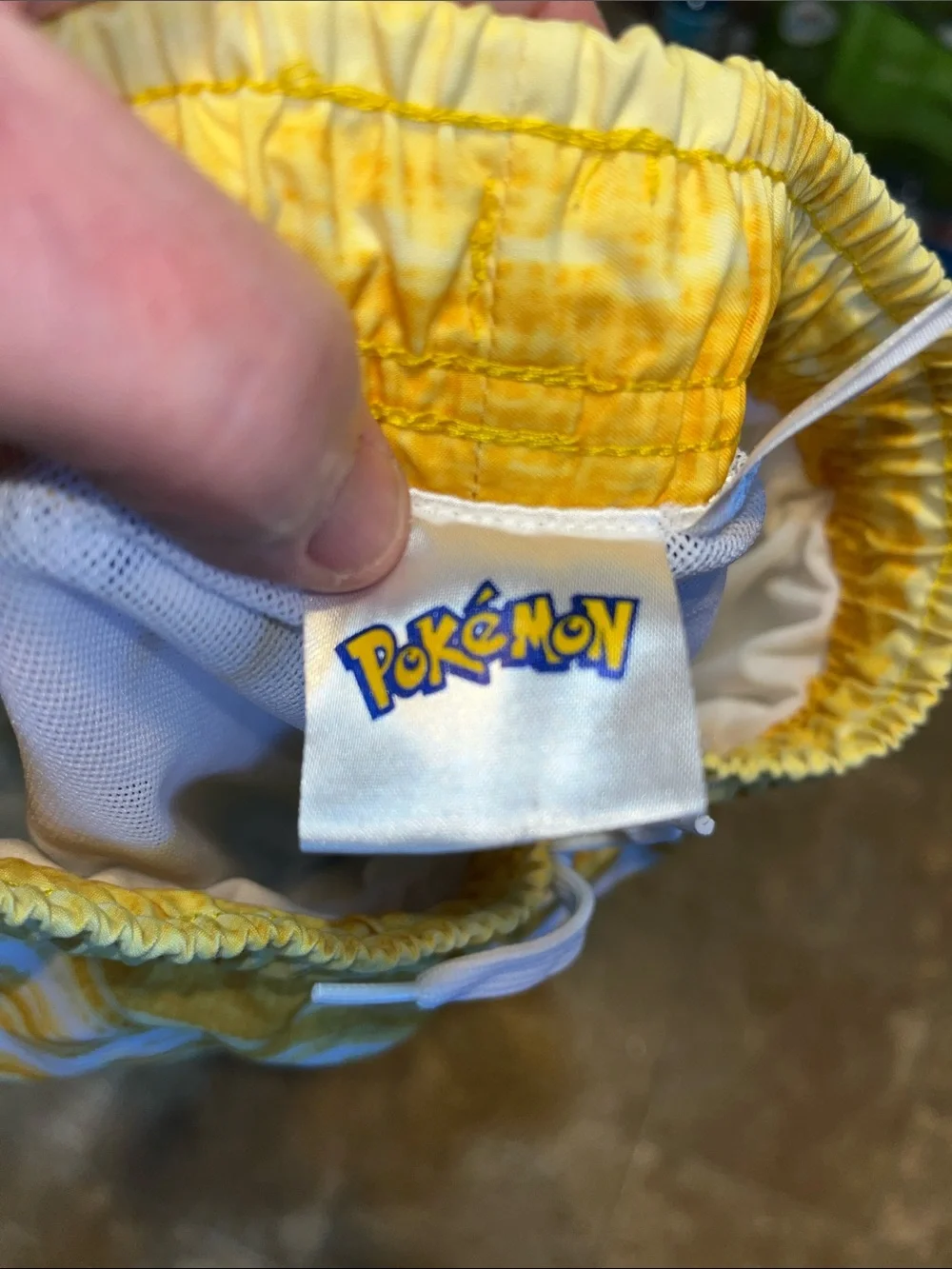 Pokemon Yellow and Blue Kids Swim Shorts with Pokéball Print